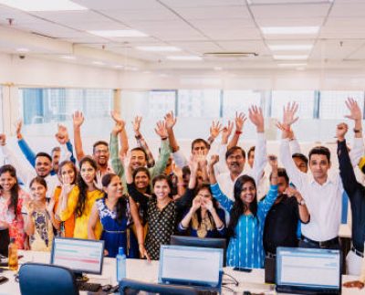Corporate Business, Indian, Office - Large Group of Cheerful Business Executives Looking at the Camera for a Group Portrait at their office